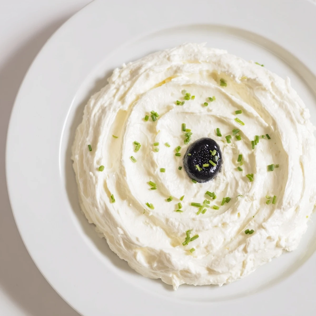 Delicate The Diamond Inlay appetizer: a gourmet treat on a serving platter, ready to serve.