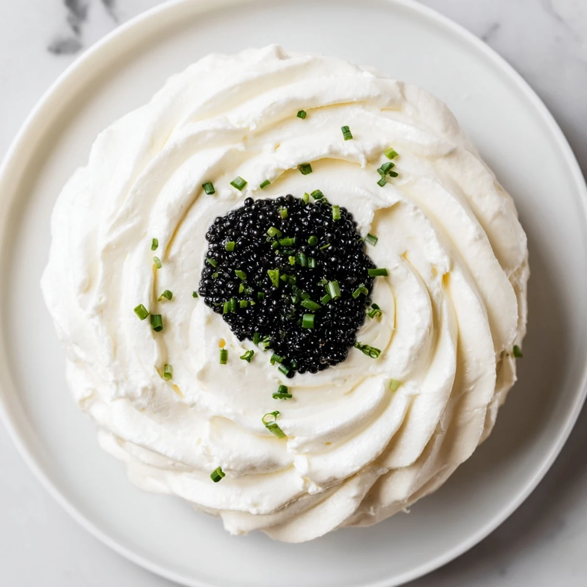 Elegant appetizer, The Diamond Inlay, features caviar nestled in creamy whipped cream cheese.