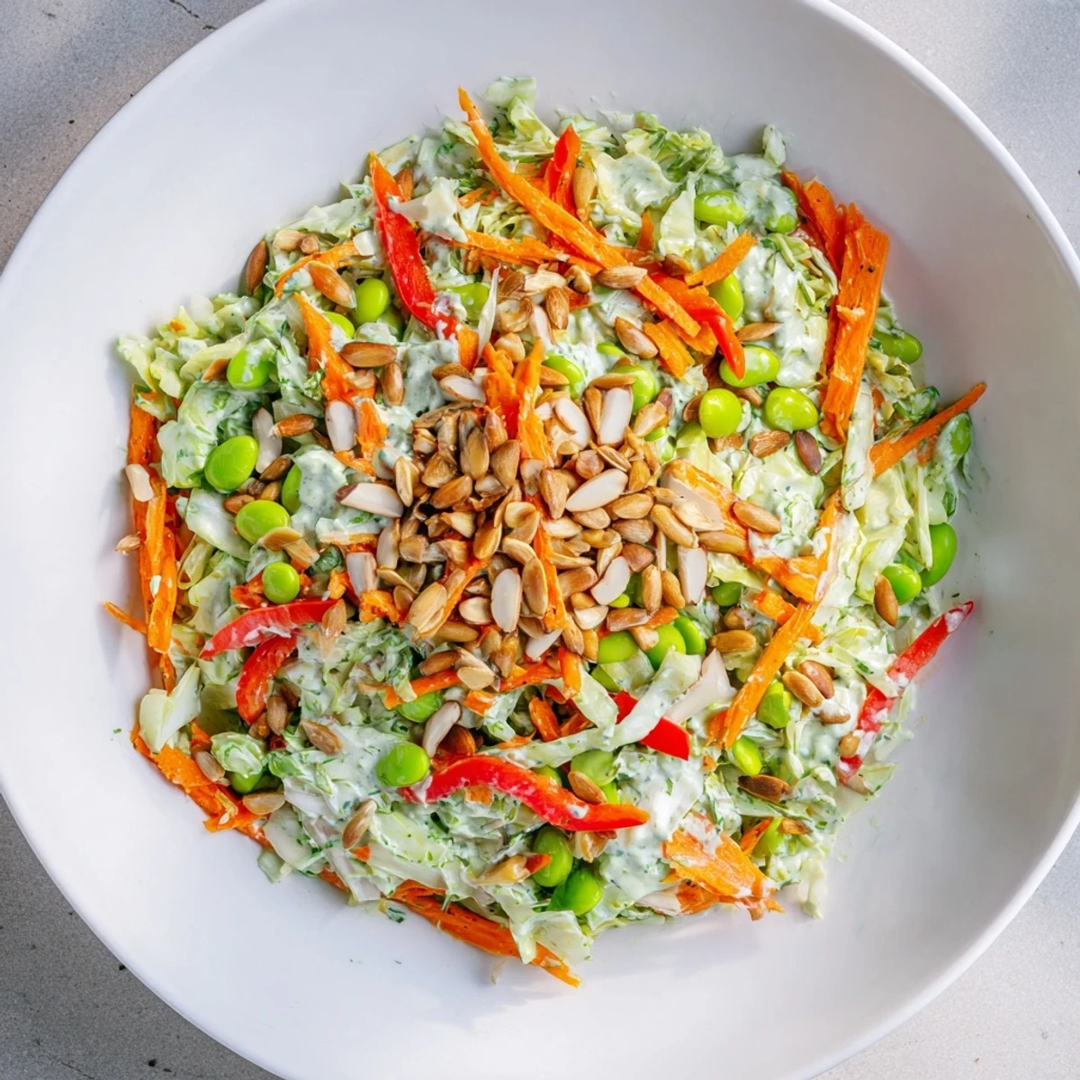 A close-up of a refreshing Crunchy Cabbage and Edamame Salad, bursting with vibrant colors and textures.