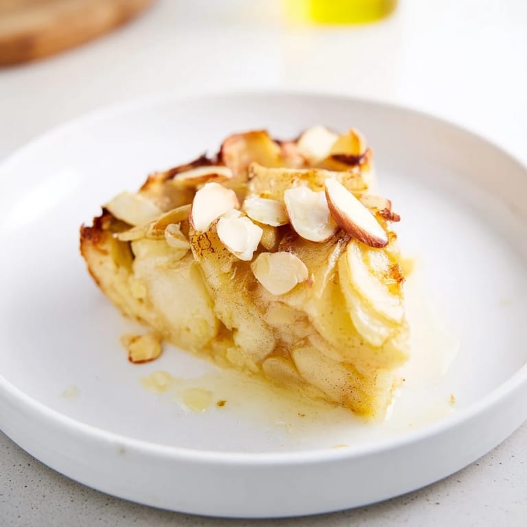 Juicy apple slices in a creamy base: a delicious, homemade Rustic Crustless Apple Pie ready to serve.